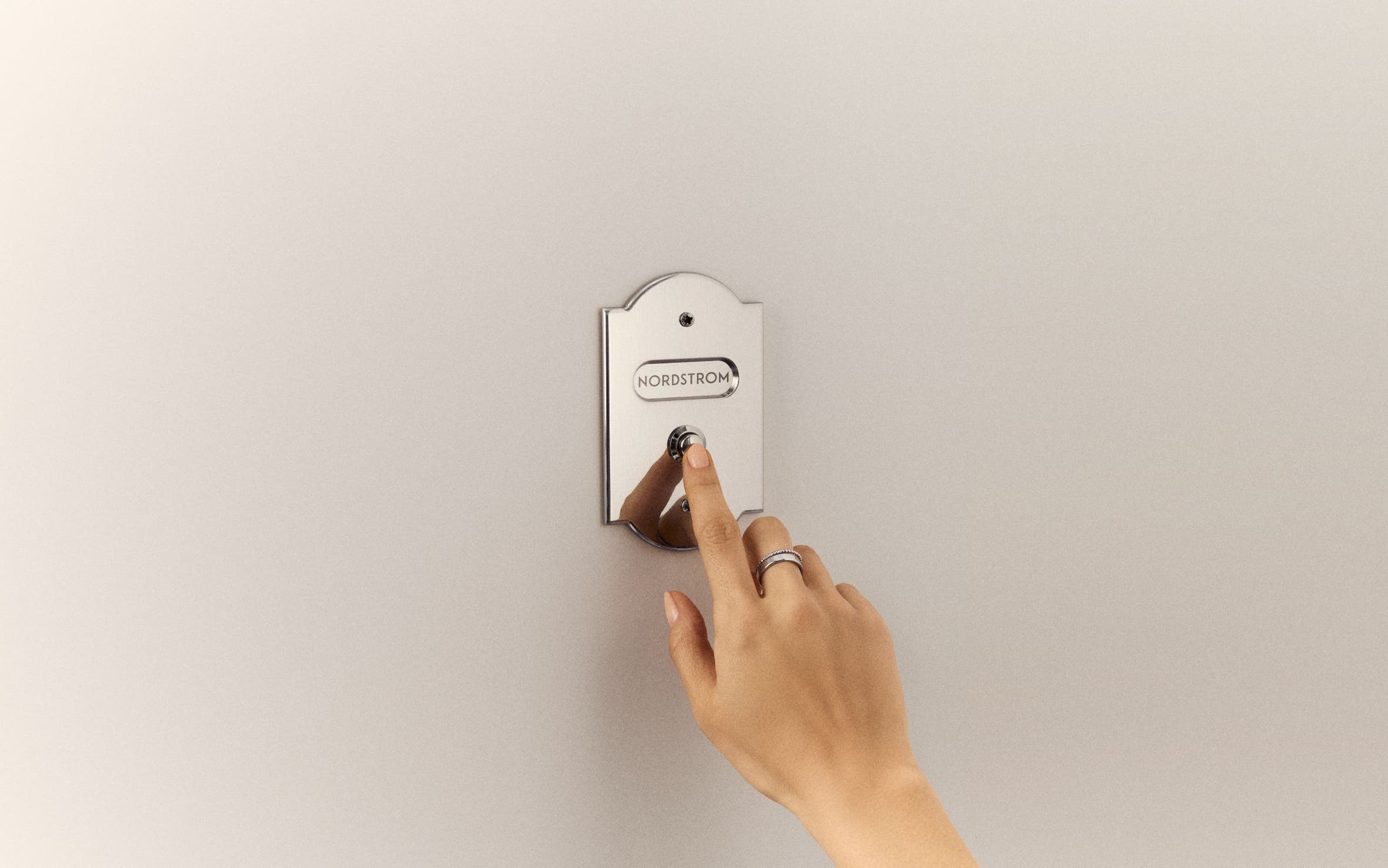 Ringing a Nordstrom doorbell.