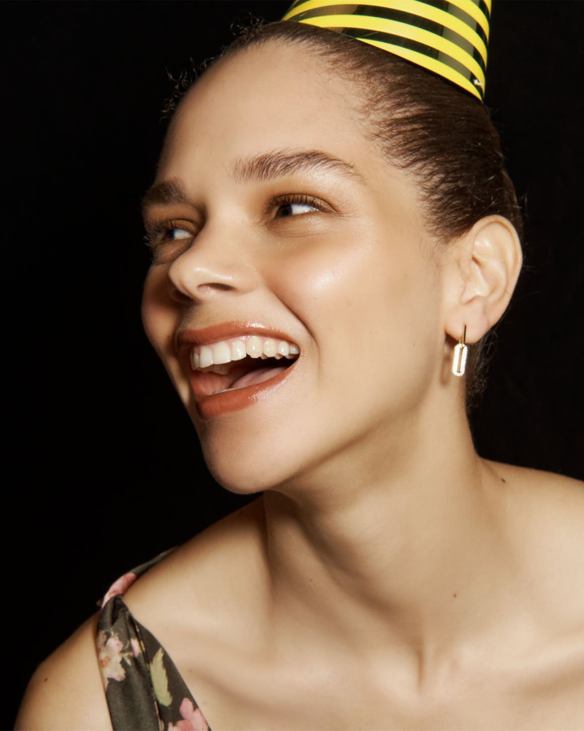 Woman in a party hat. 