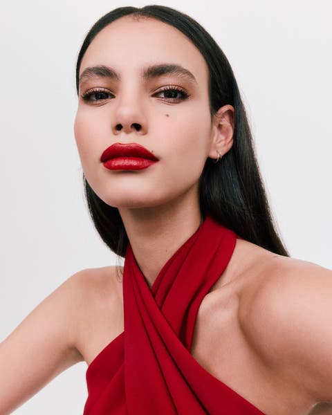 A woman with a bold red lip.