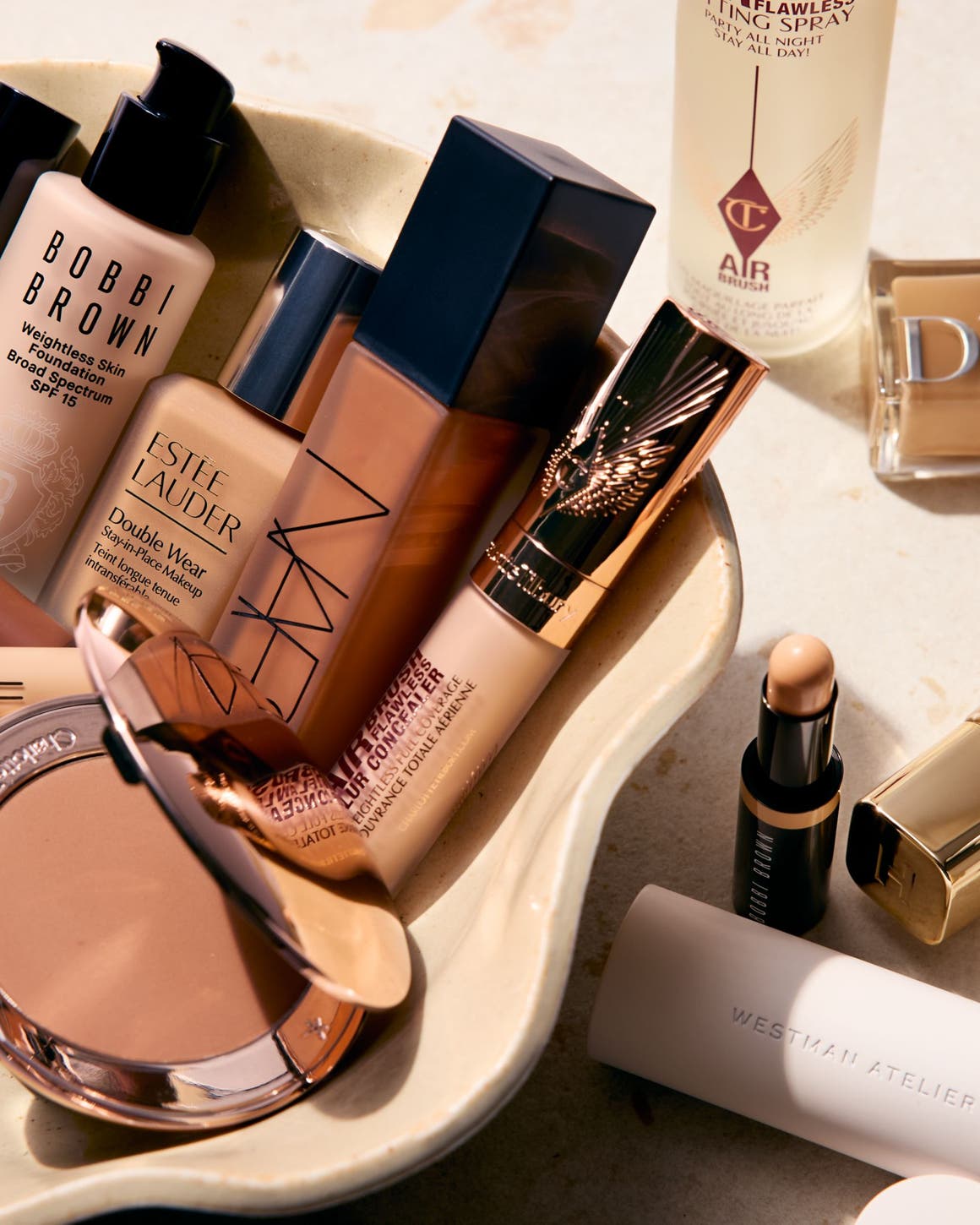 Foundations, concealers and setting spray