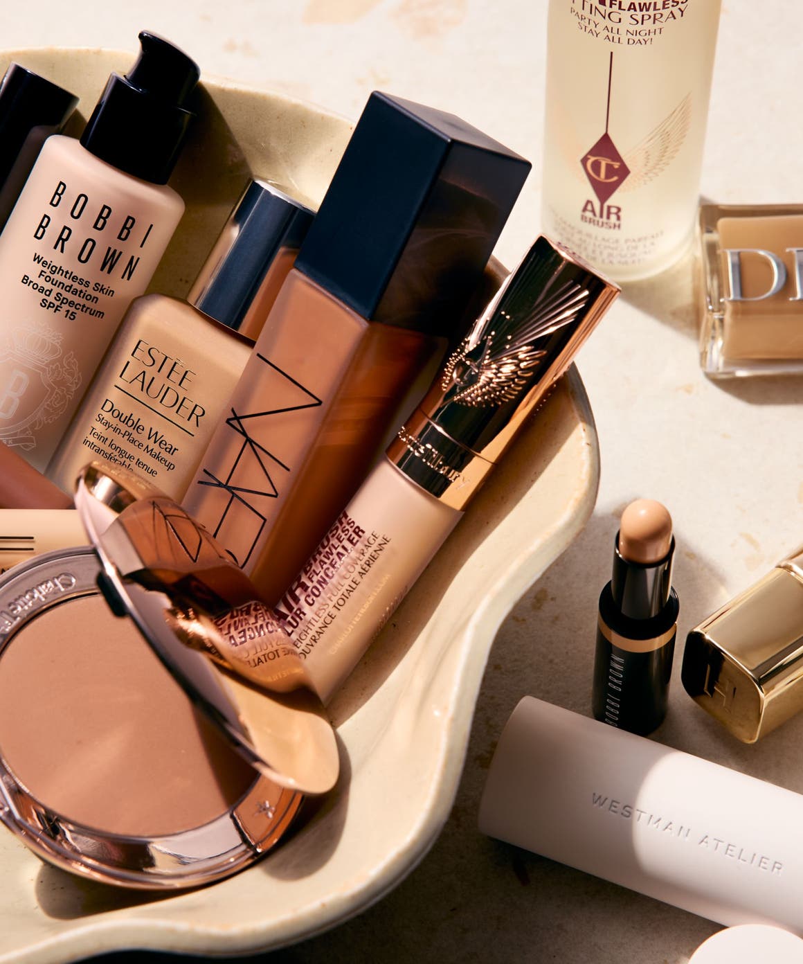 Foundations, concealers and setting spray