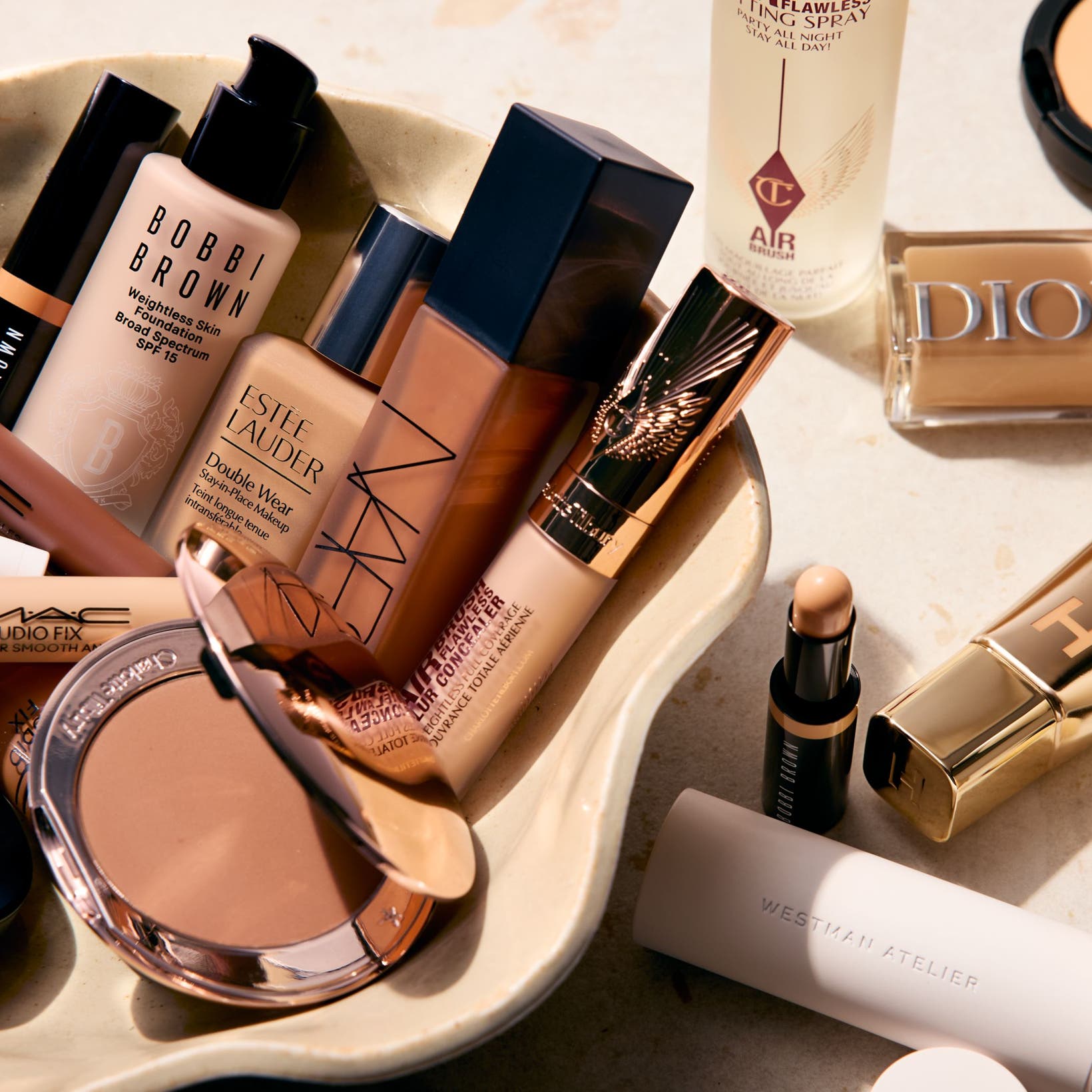 Foundations, concealers and setting spray