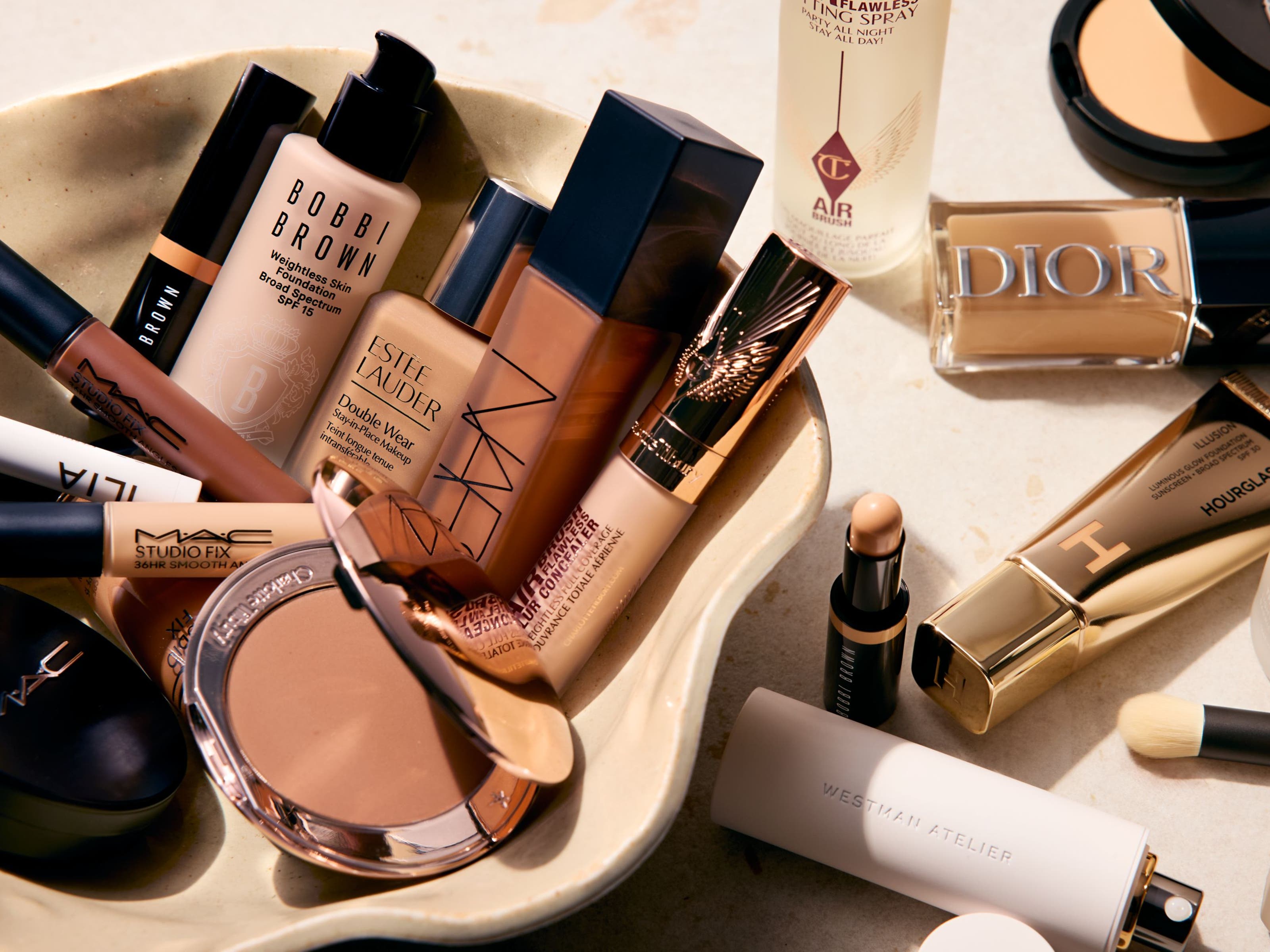 Foundations, concealers and setting spray