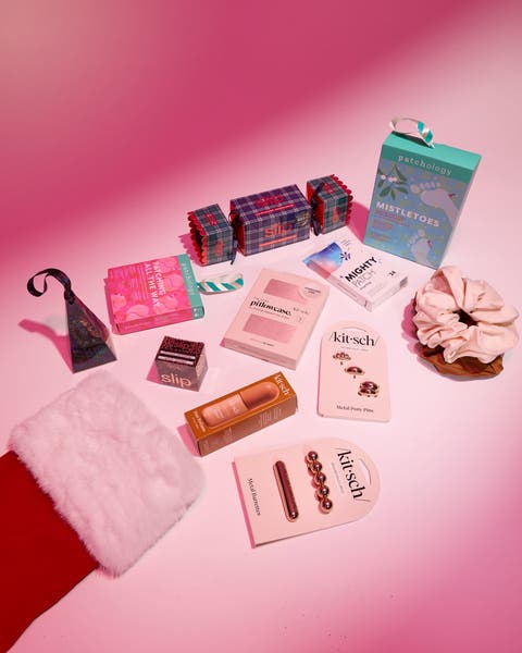 Beauty and hair gifts spilling from a red stocking.