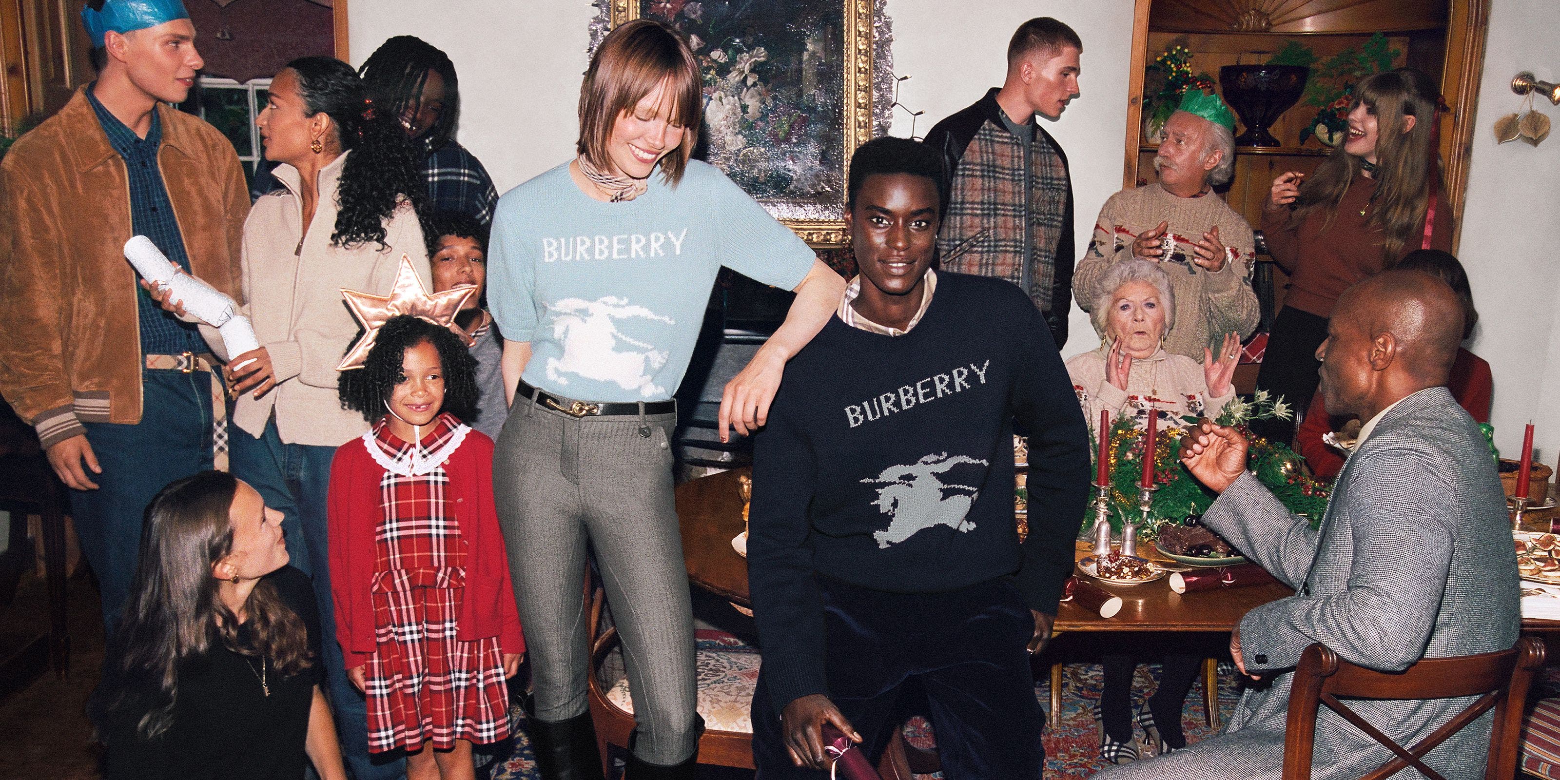 A group of people wearing Burberry.