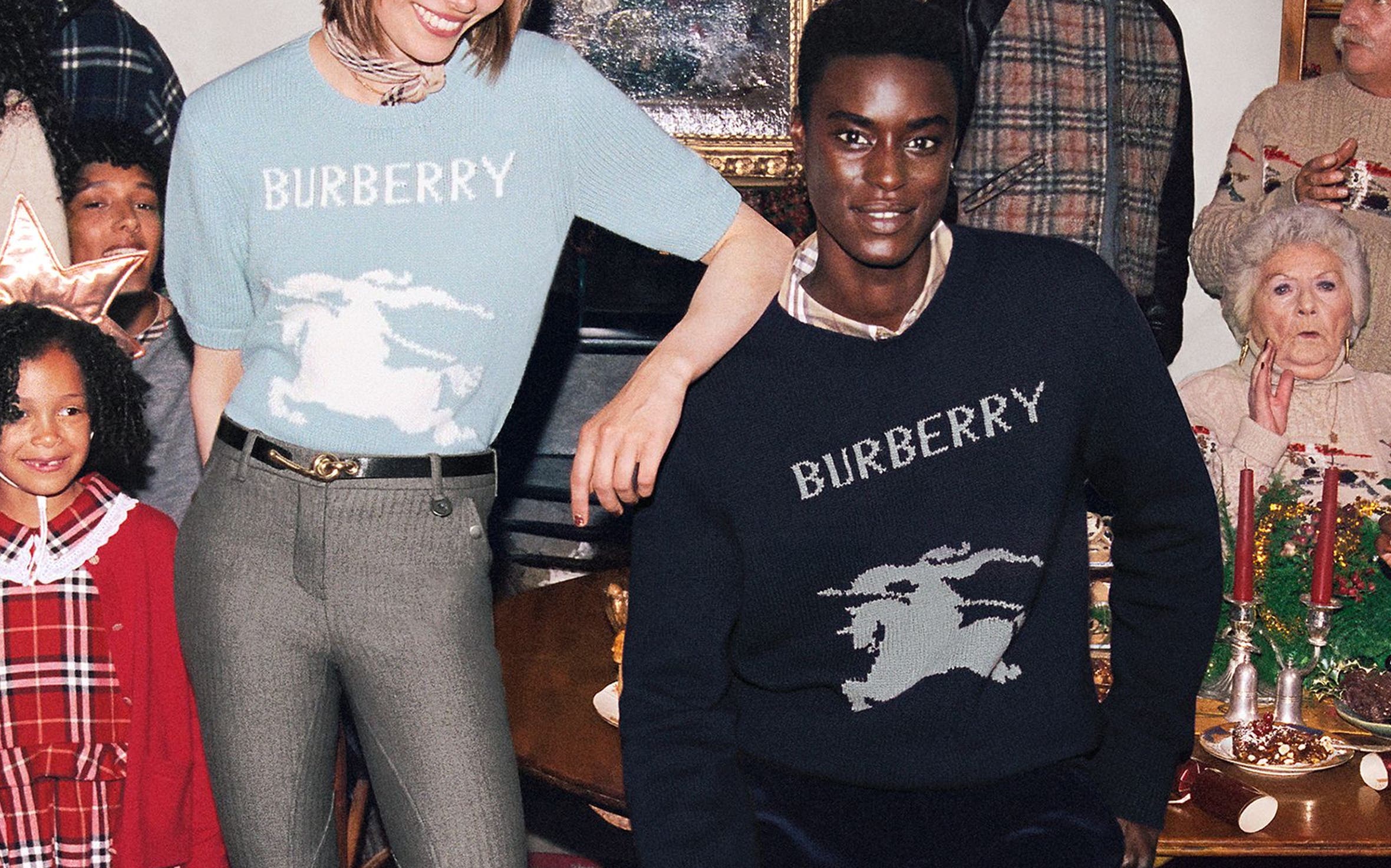 A group of people wearing Burberry.