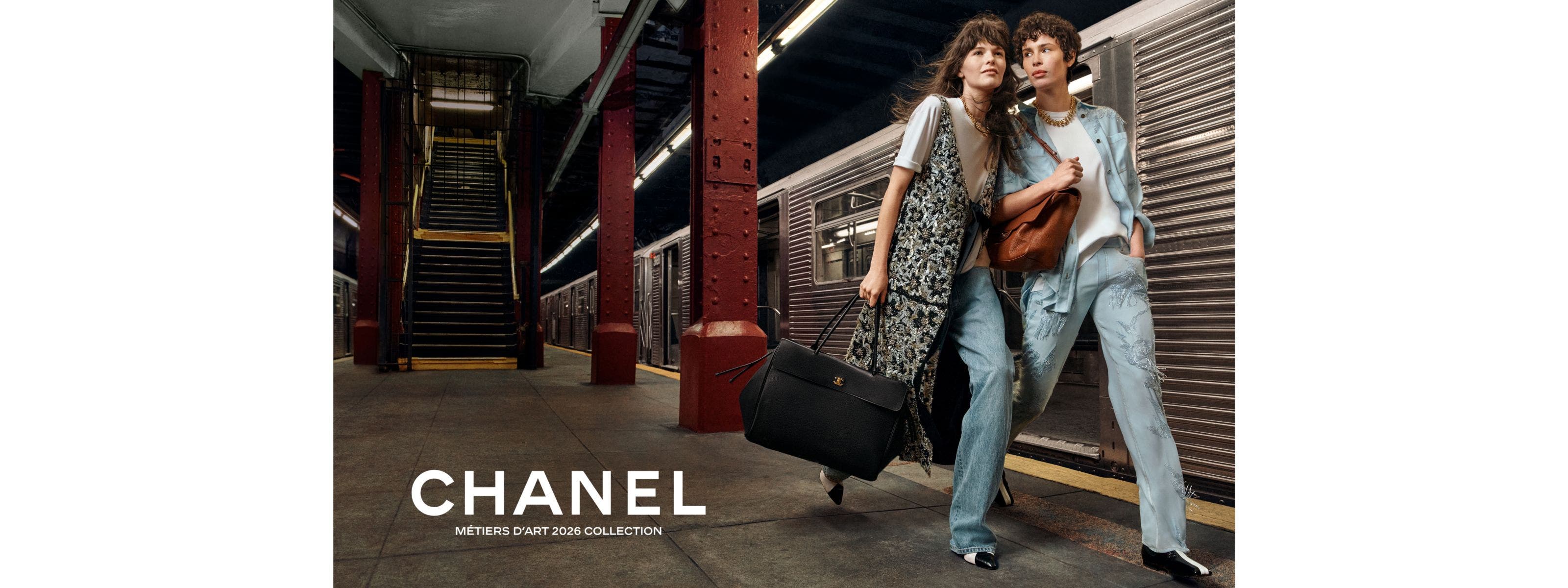 two women at train station wearing CHANEL