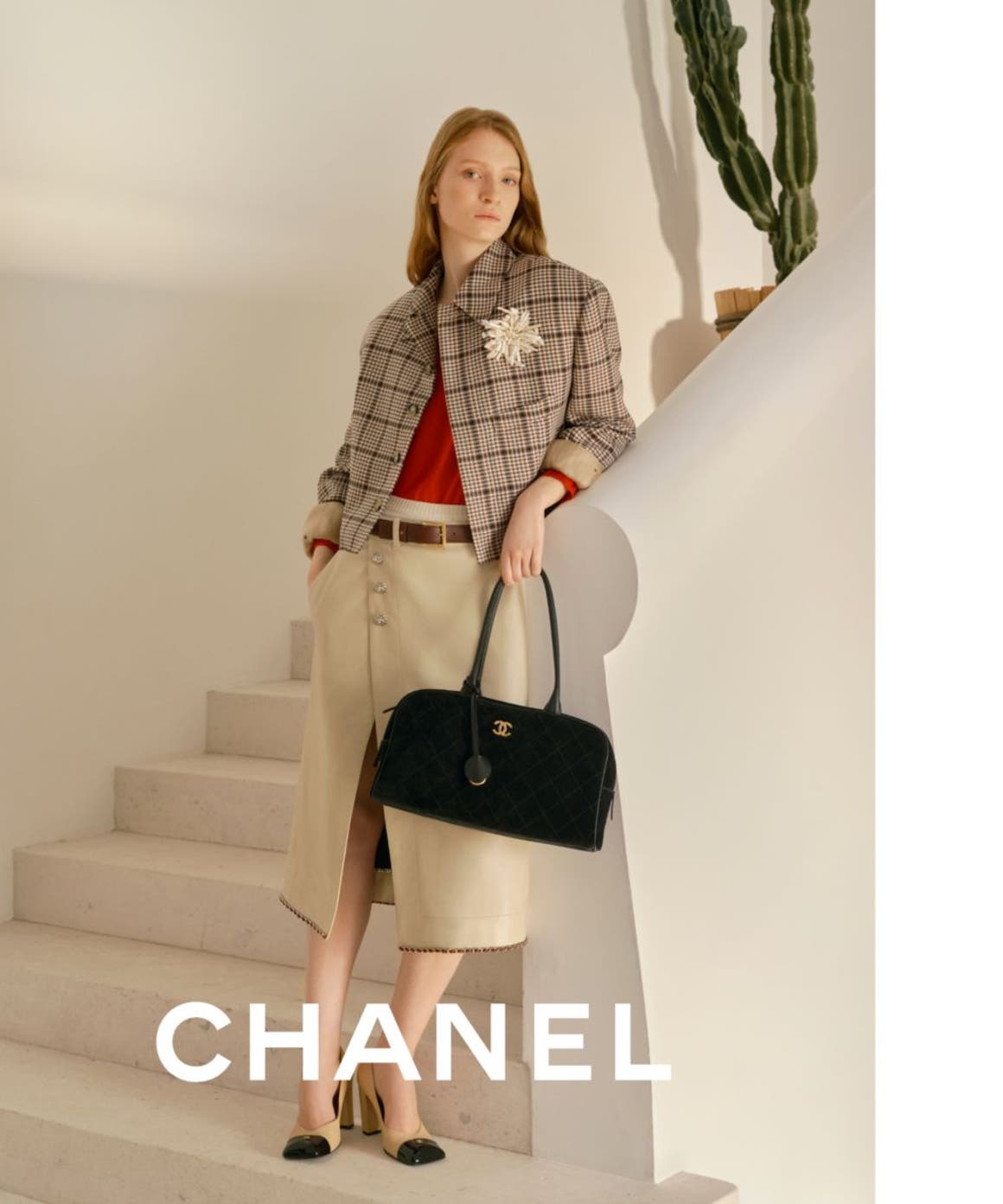 two women wearing CHANEL looks