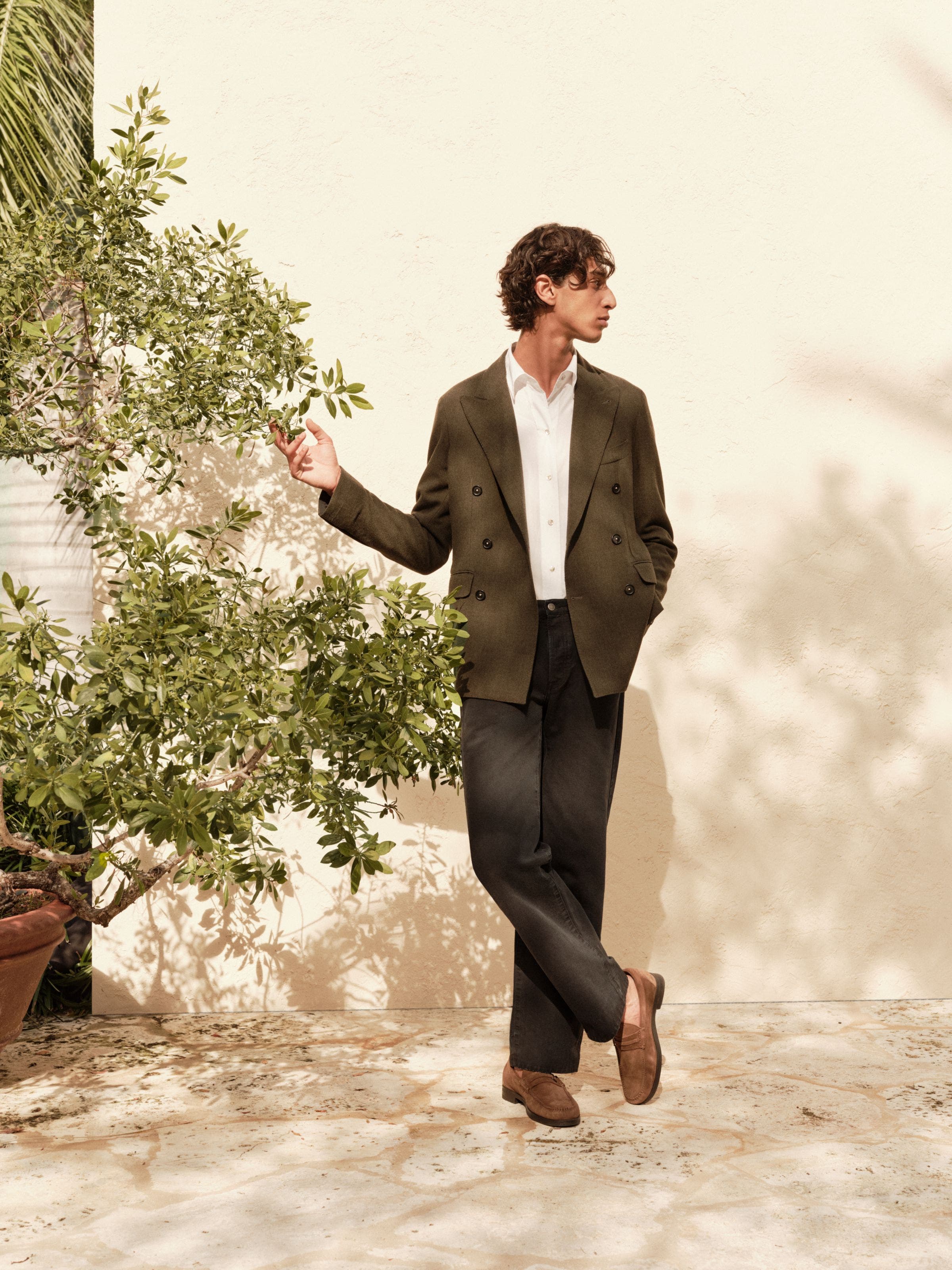 Man wearing Massimo Alba jacket and pants with Vince shirt.