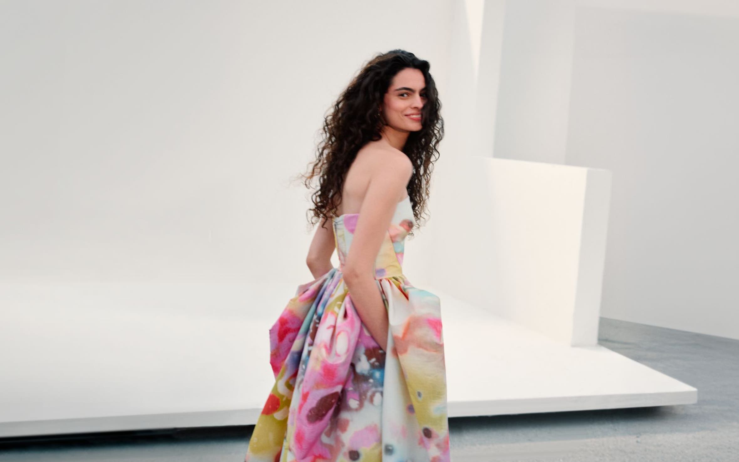 Woman wearing Christopher John Rogers gown.