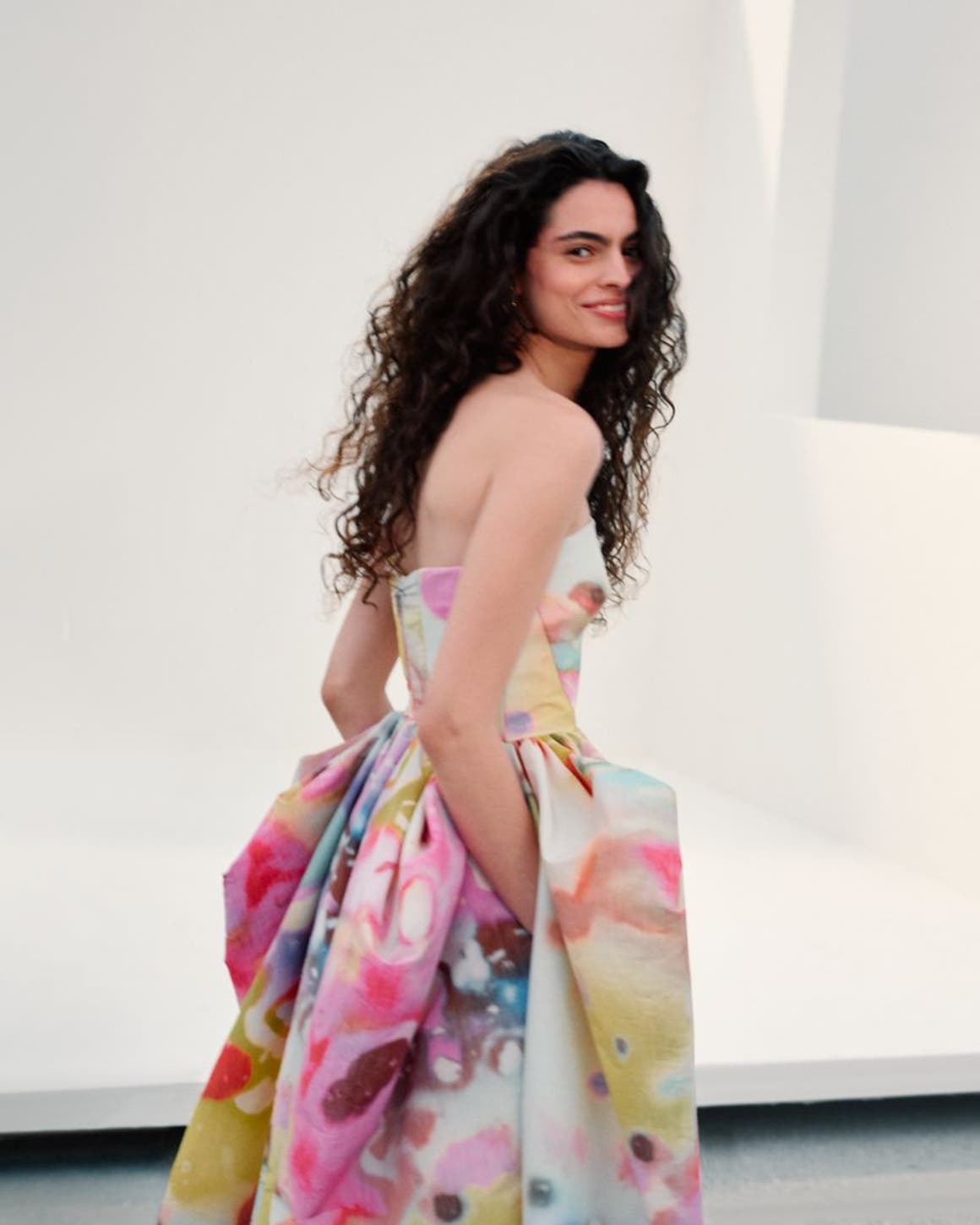 Woman wearing Christopher John Rogers gown.