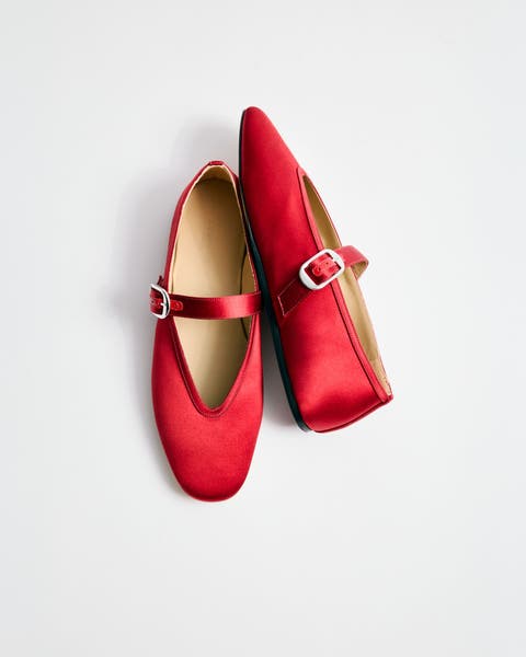 Red satin Mary Jane flats.