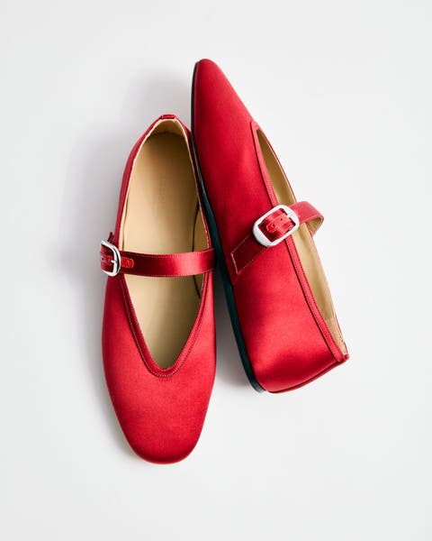 Red satin Mary Jane flats.