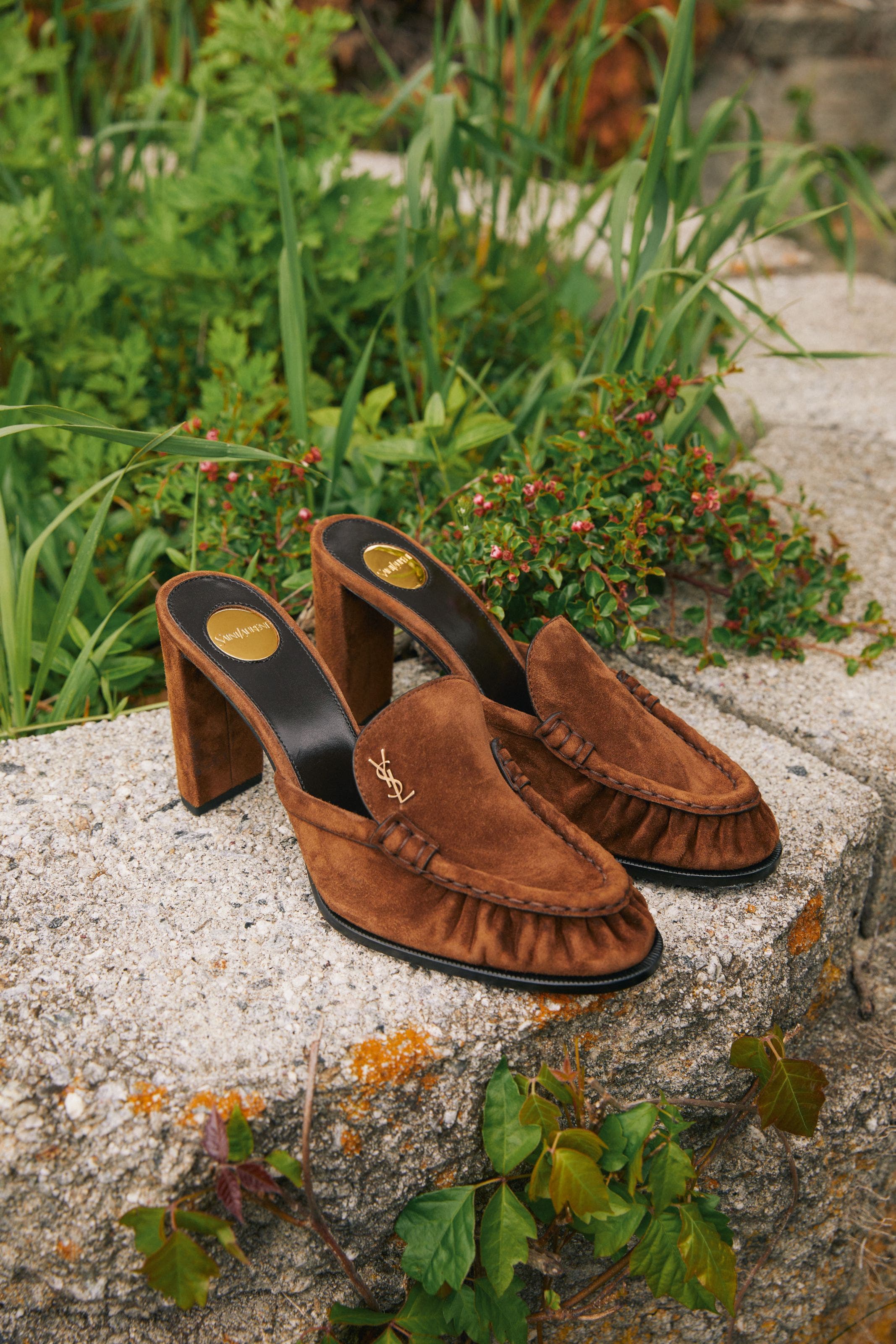Brown suede mule pumps from Saint Laurent.
