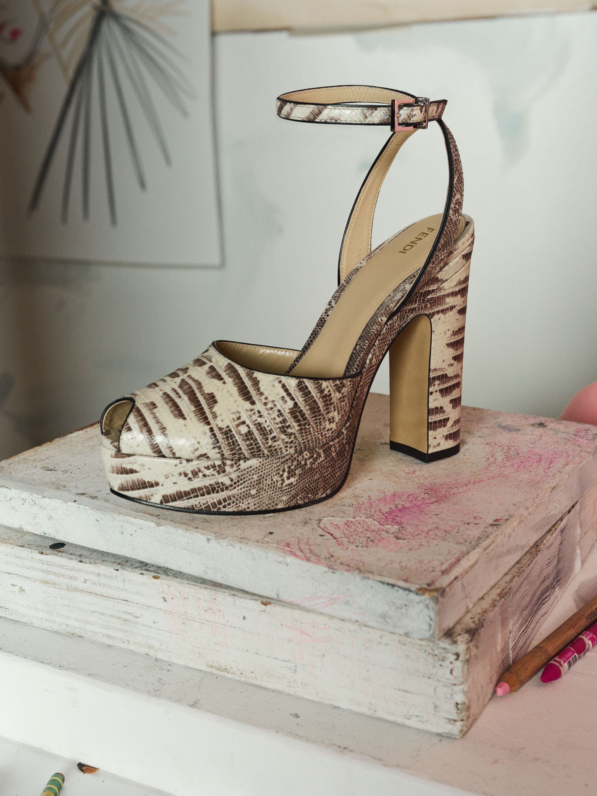 Strappy metallic gold high-heel sandal.