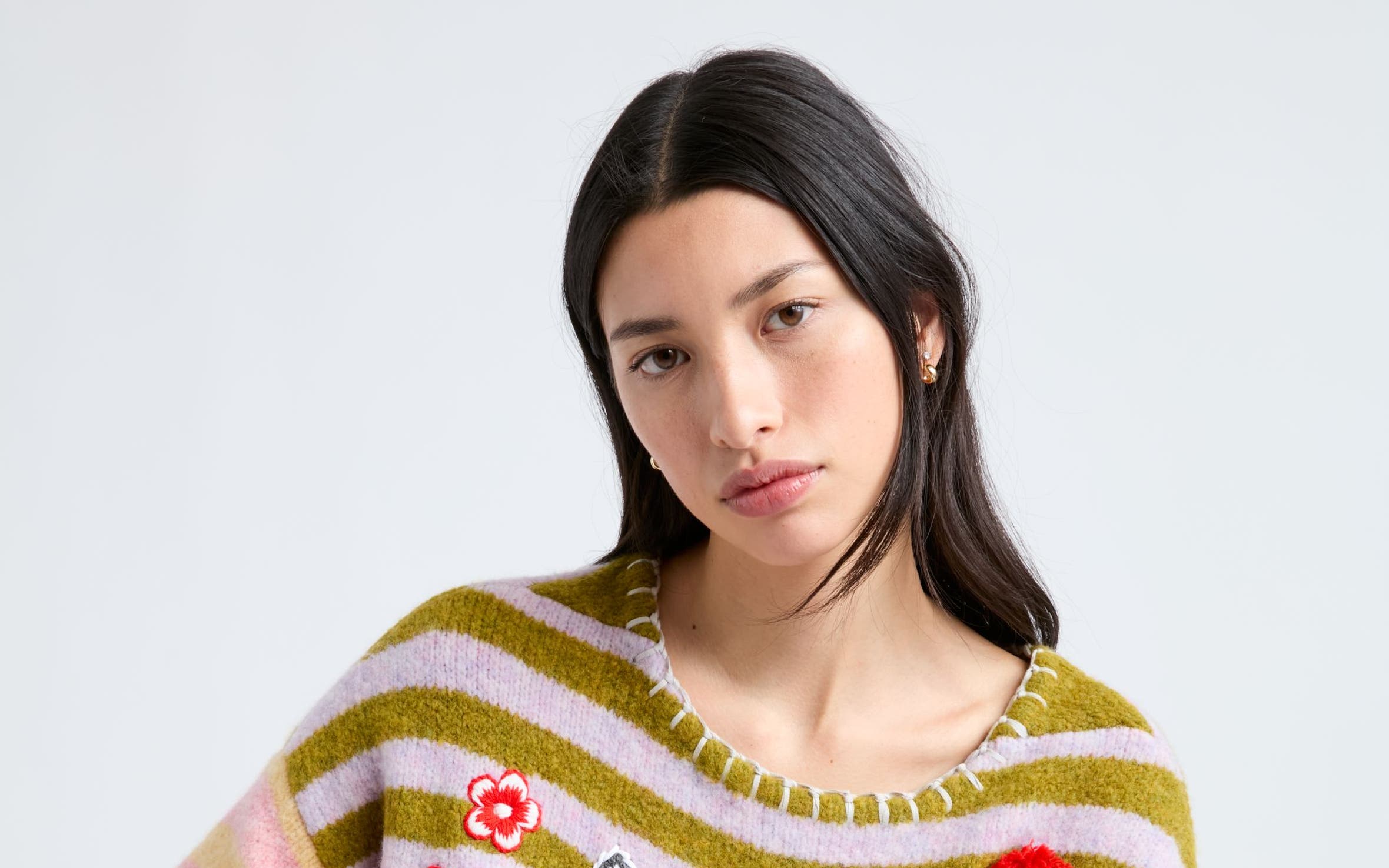Woman wearing a YanYan sweater