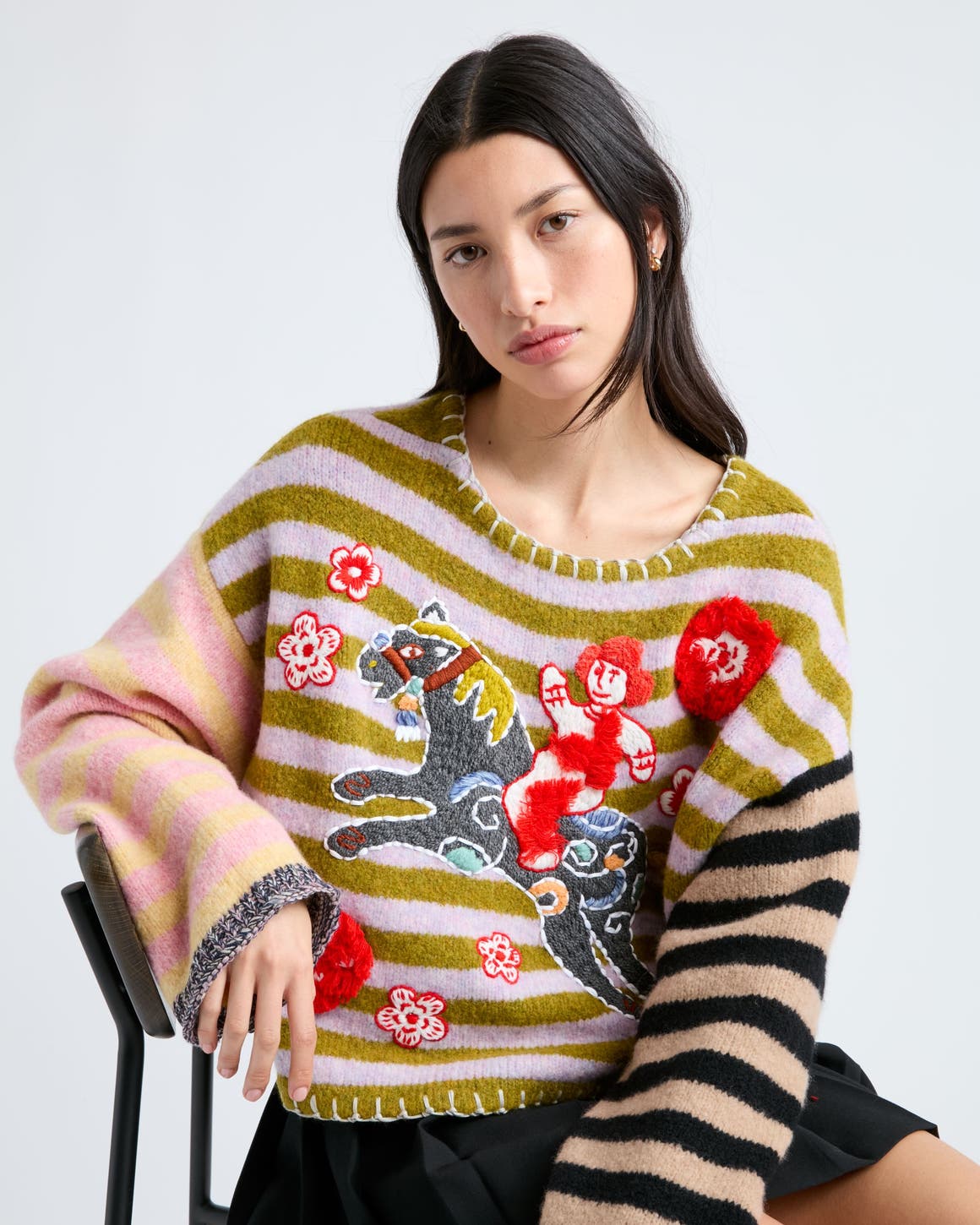 Woman wearing a YanYan sweater