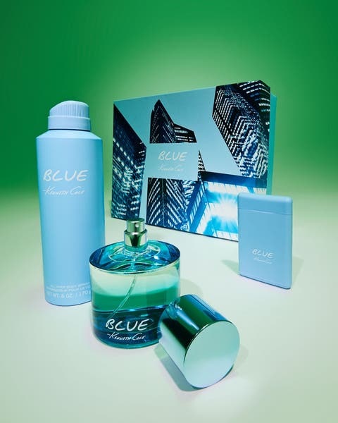 Kenneth Cole Blue fragrance gift set including eau de toilette, body spray, and mini bottle with gift box.