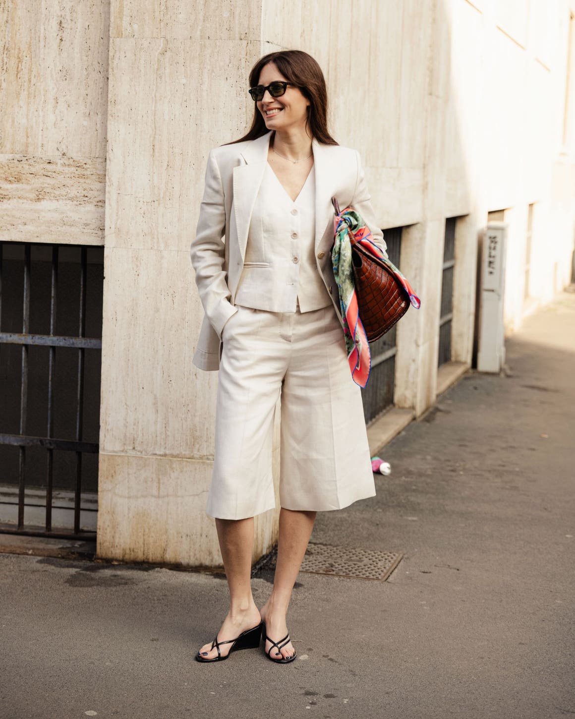 Woman wearing a short suit at Milan Fashion Week.