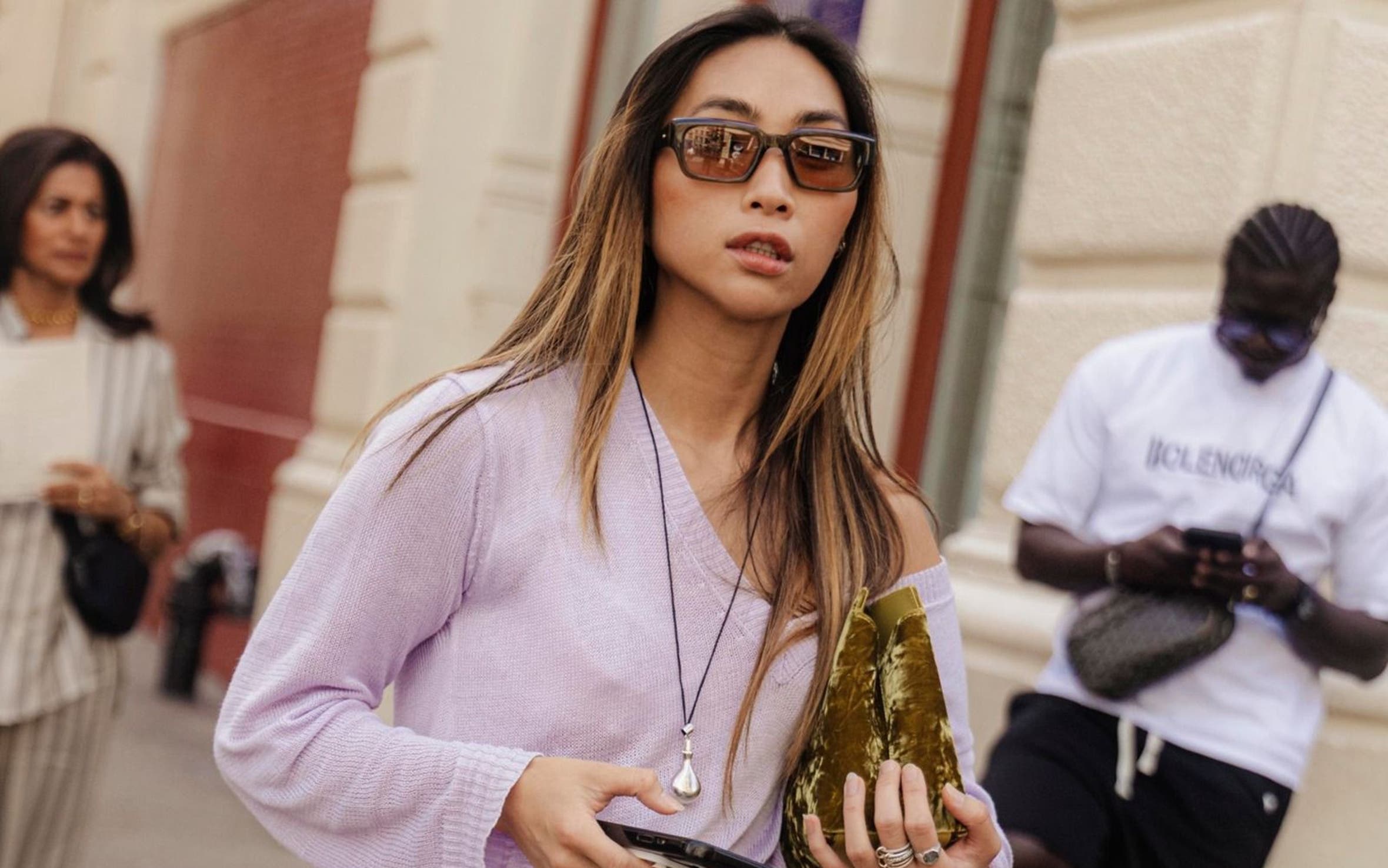 Model in lavender top and sequin skirt, street style