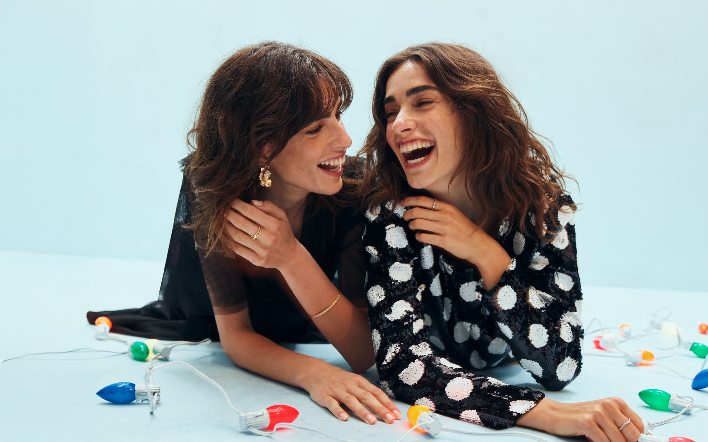 Two women laughing.