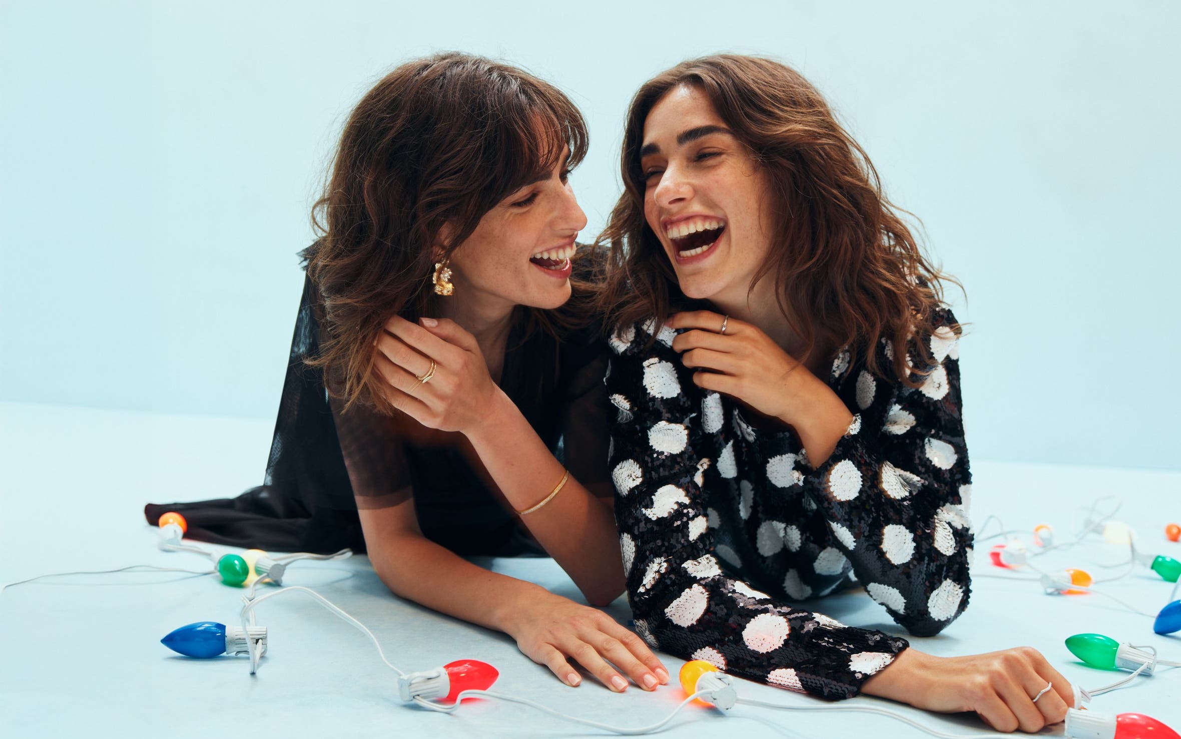 Two women laughing.