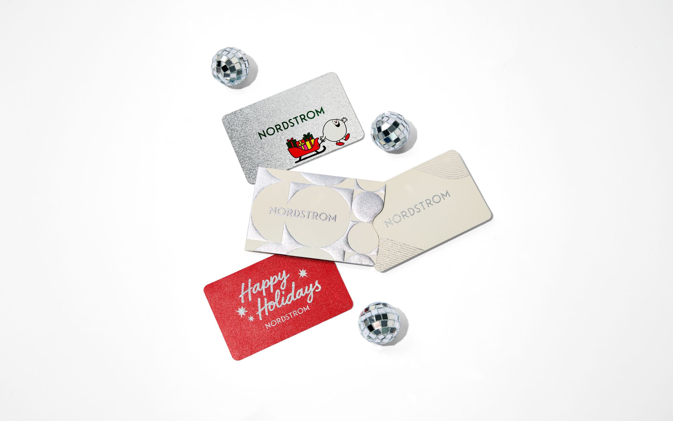Assortment of Nordstrom holiday gift cards.