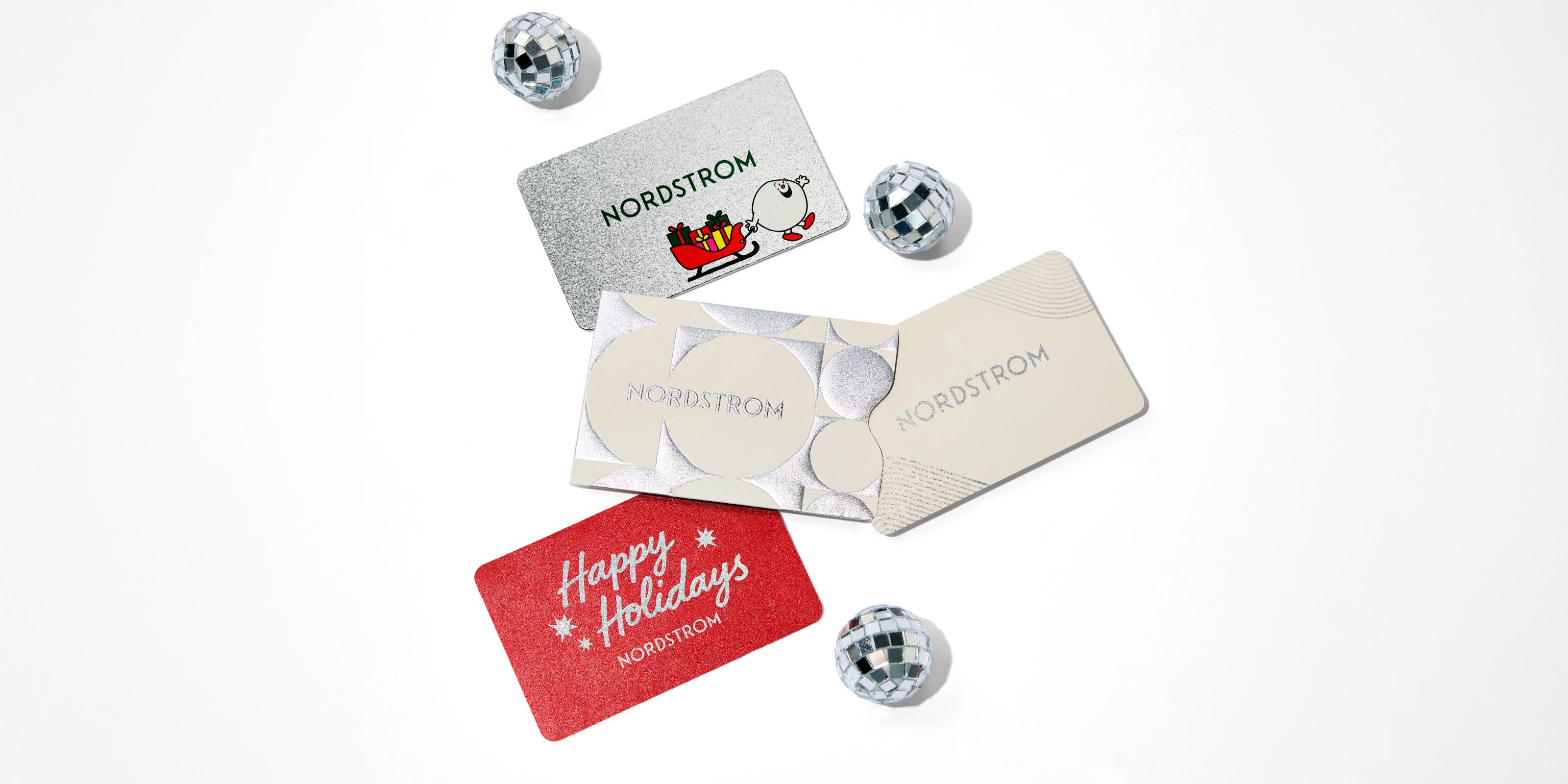 Assortment of Nordstrom Holiday gifts cards.