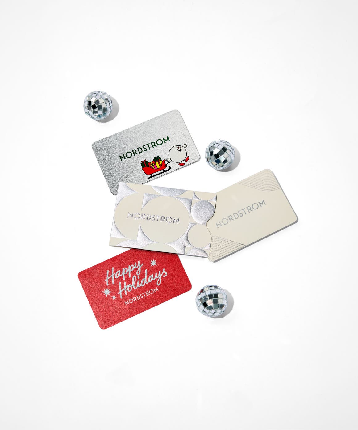 Assortment of Nordstrom Holiday gifts cards.