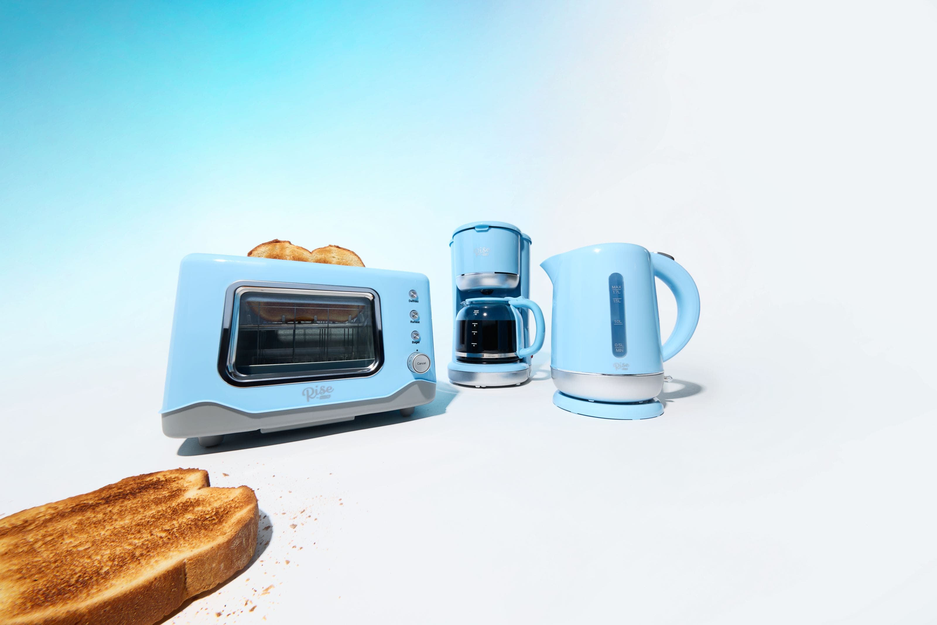 A variety of blue kitchen appliances.