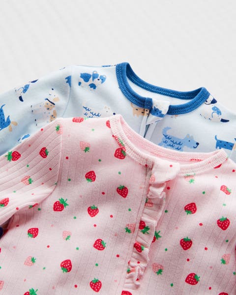 A pair of printed onesies.