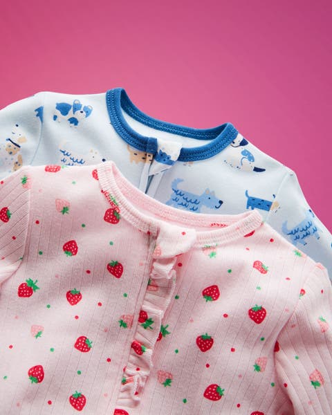 A pair of printed onesies.