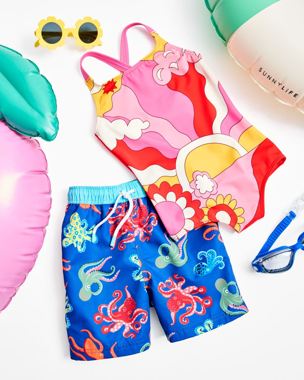 A collection of swimwear, accessories and toys for kids.