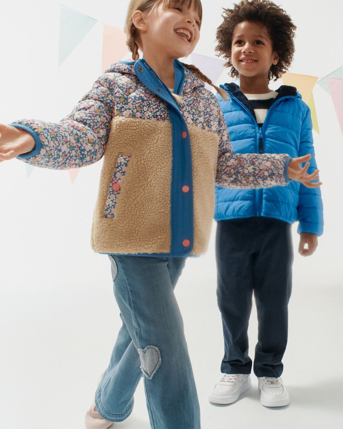 Two kids in new jackets. 
