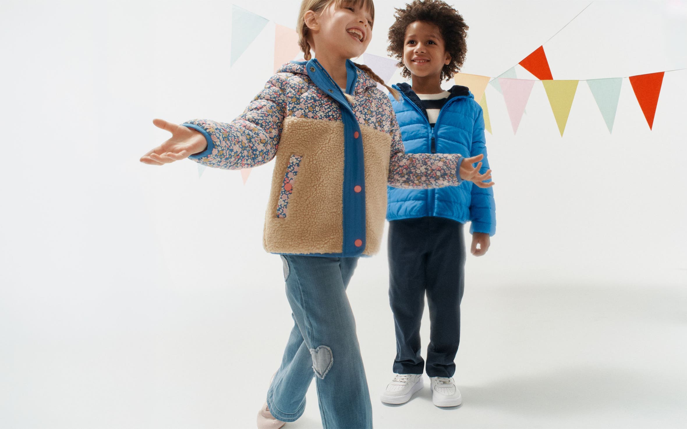 Two kids in new jackets. 