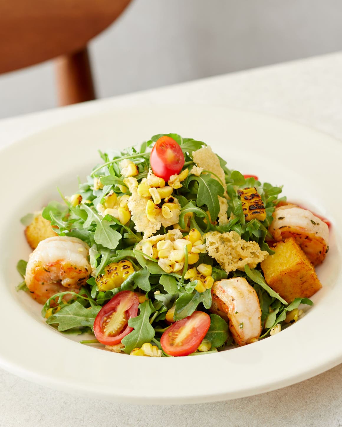 A Nordstrom salad with grilled shrimp.