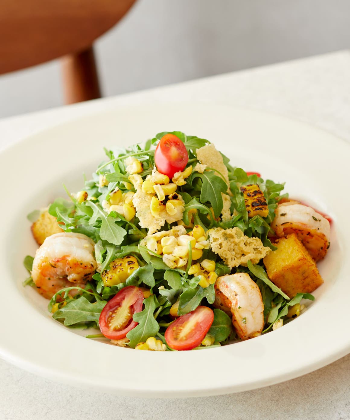 A Nordstrom salad with grilled shrimp.