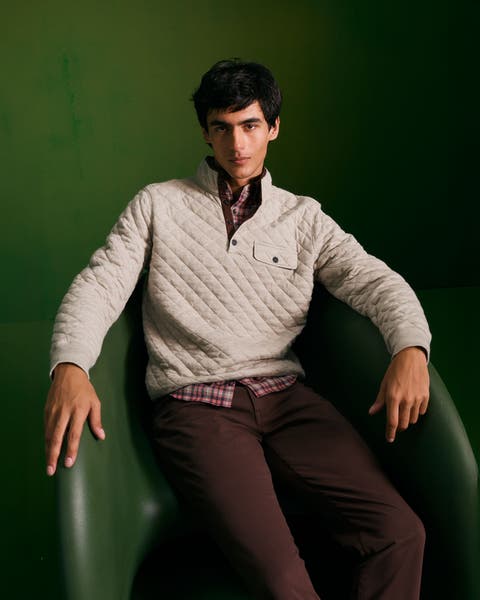 A man wearing new fall clothing.