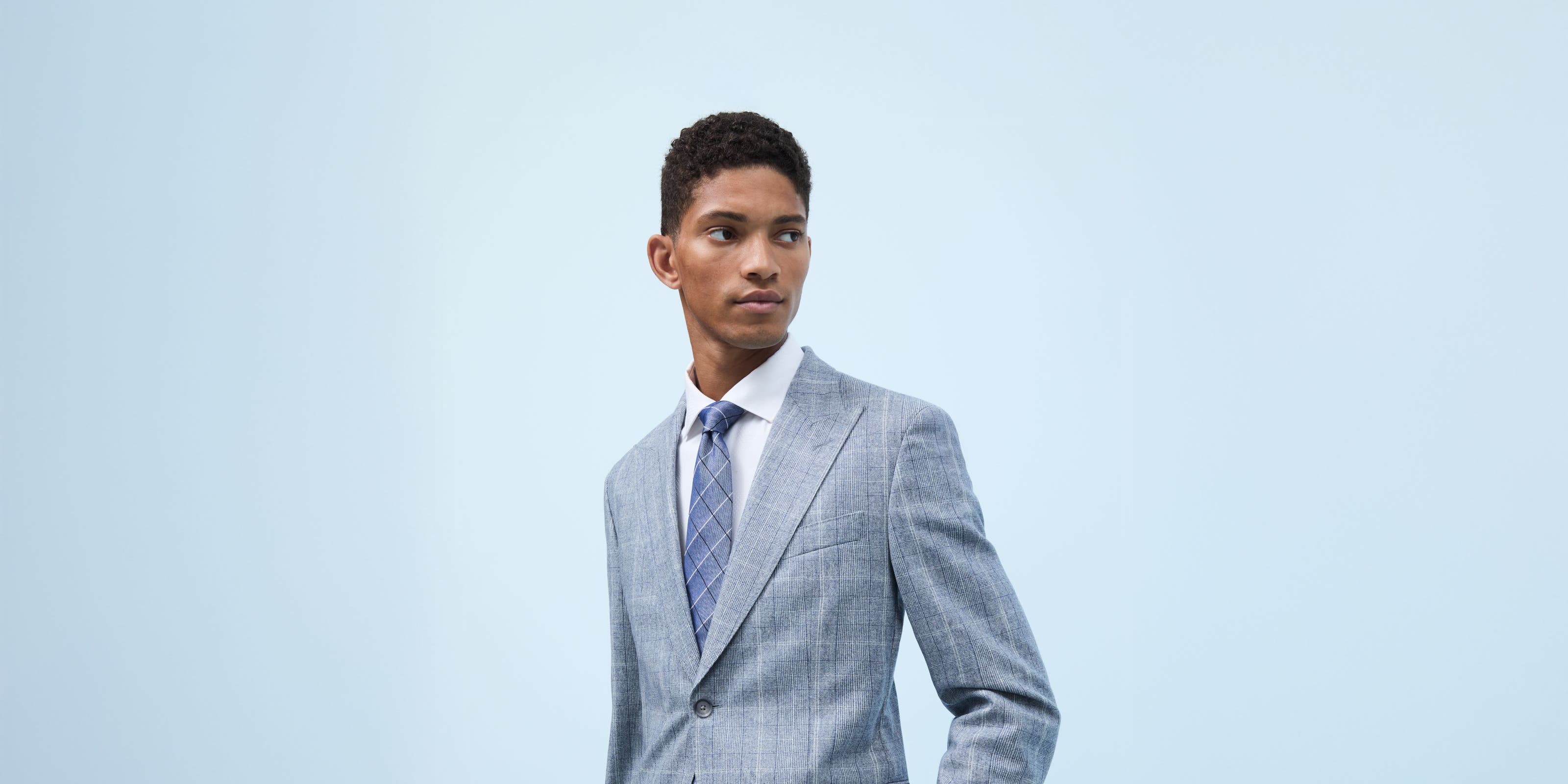 Man wearing a grey suit.