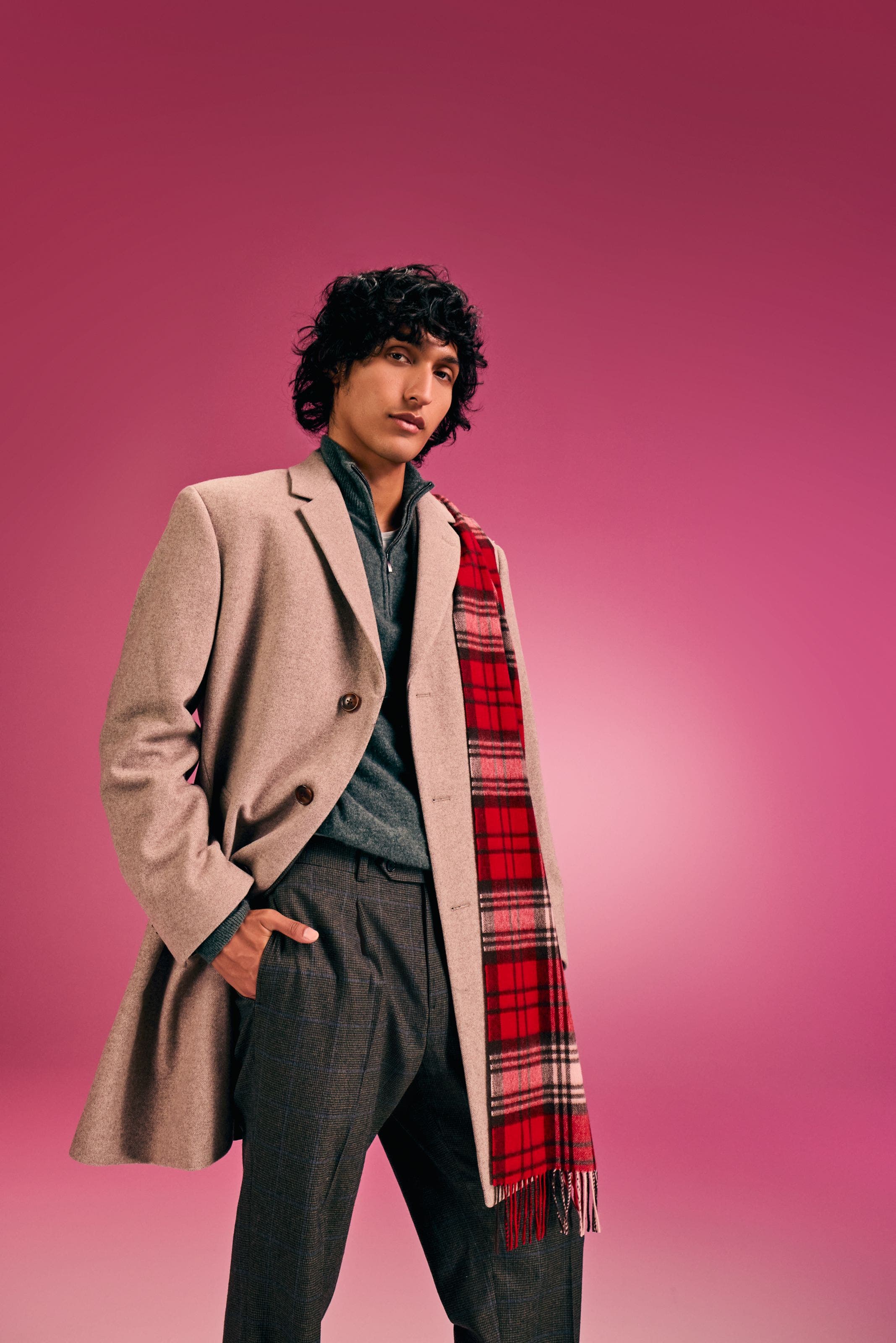 Man in a peacoat.