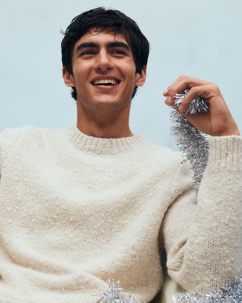 Man wearing a sweater.