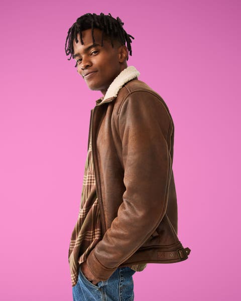 A man wearing a leather jacket.