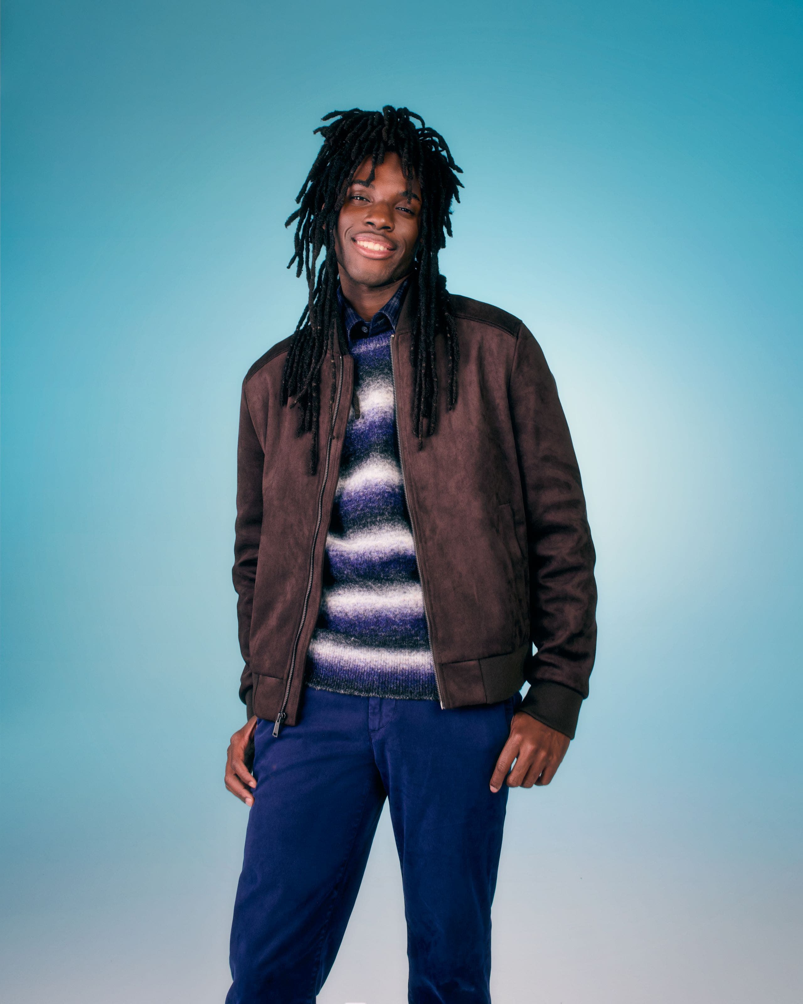 A man wearing a leather jacket.