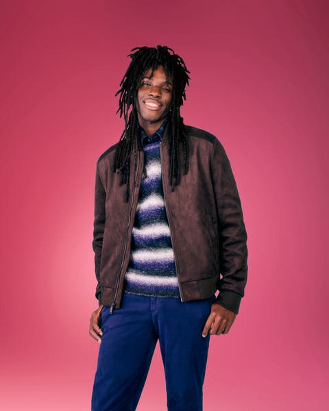 A man in a leather jacket.