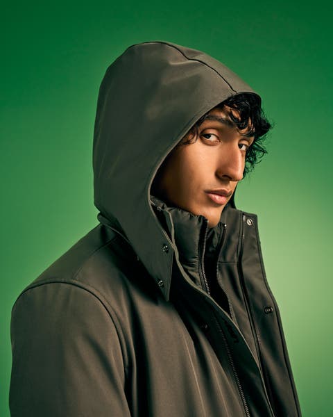 A man in a rain jacket.