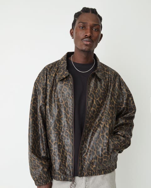A man wearing a leopard jacket.