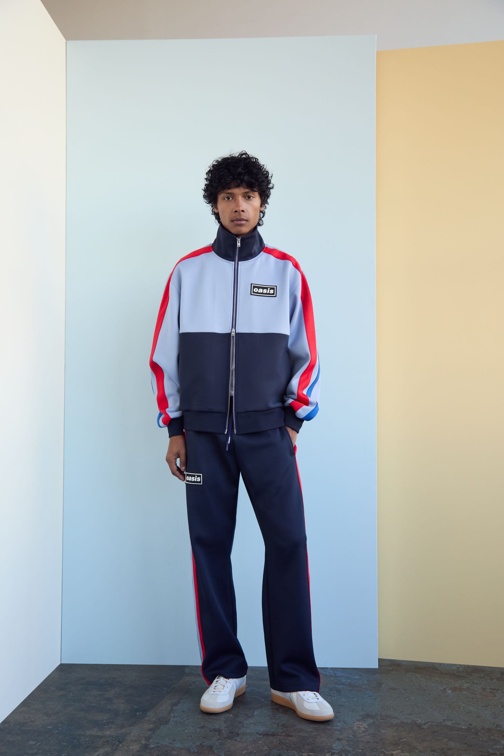 A man wearing an activewear jacket.