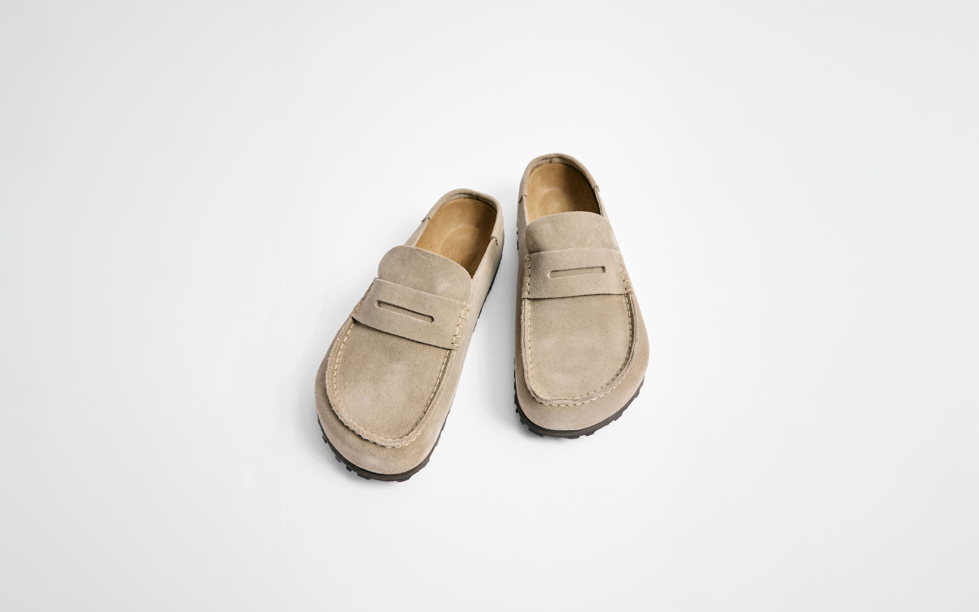 Suede penny loafer clogs.