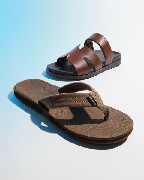 Two men's brown sandals.