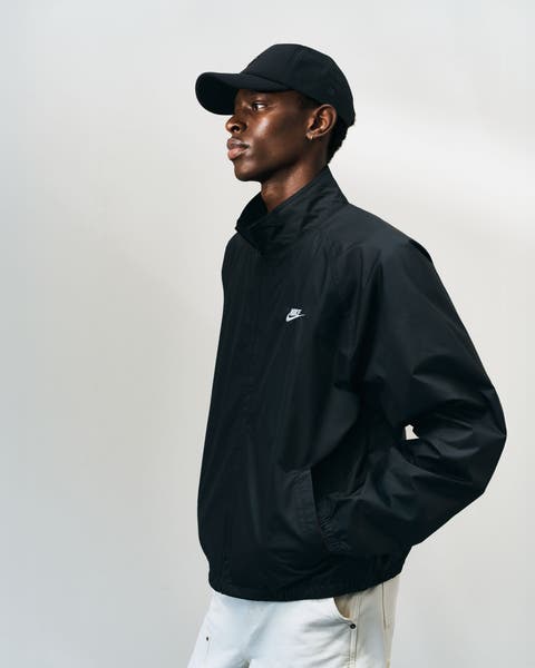 A man wearing a lightweight jacket.